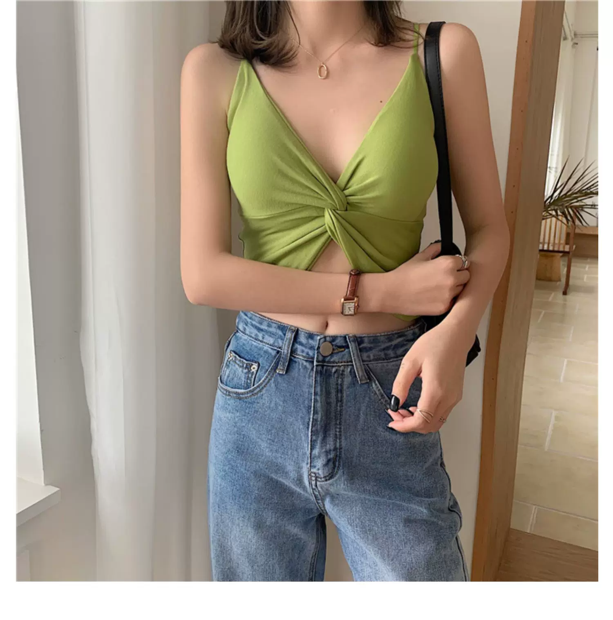 Front view of green twist-front padded bralette with V-neck and slim straps