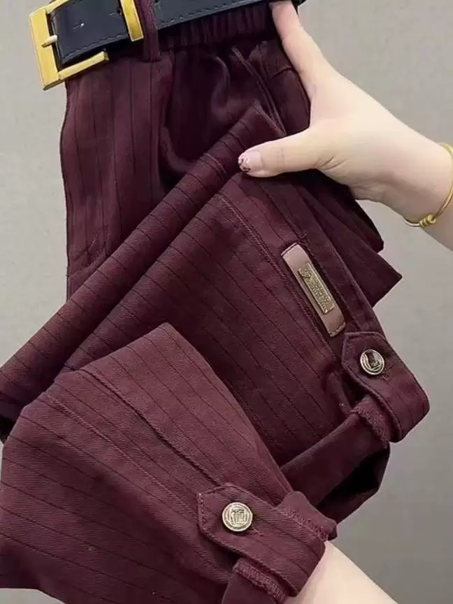 Burgundy striped pants with button-tab cuff detailing