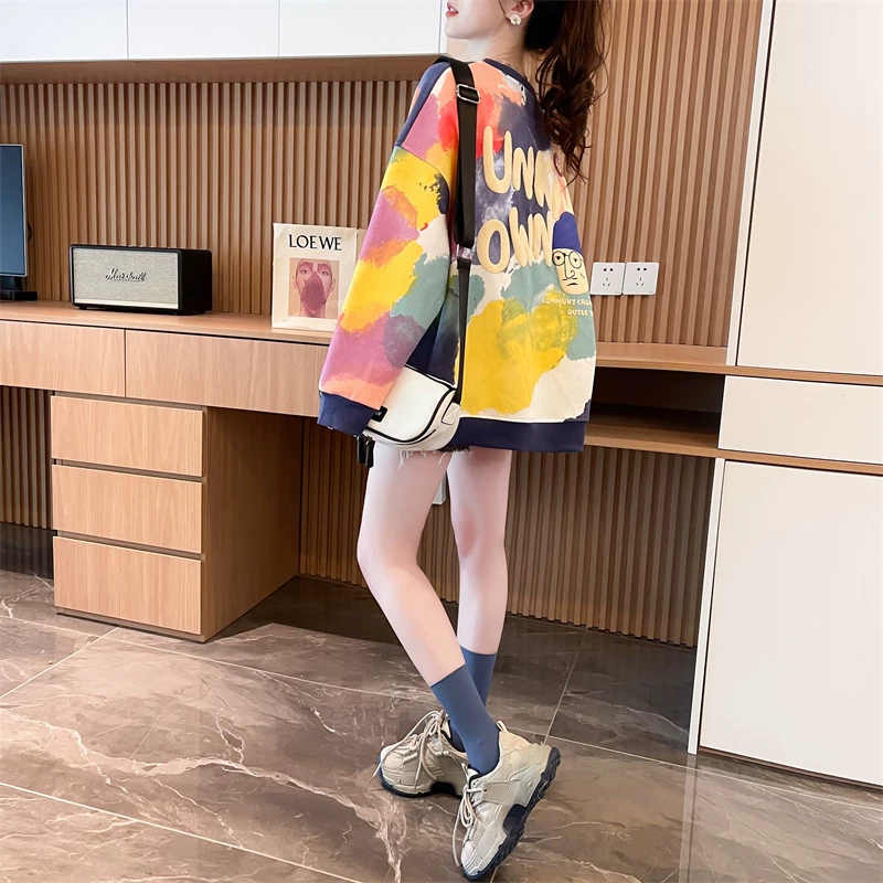 Angled rear view of multicolour winter T-shirt with graphic detailing